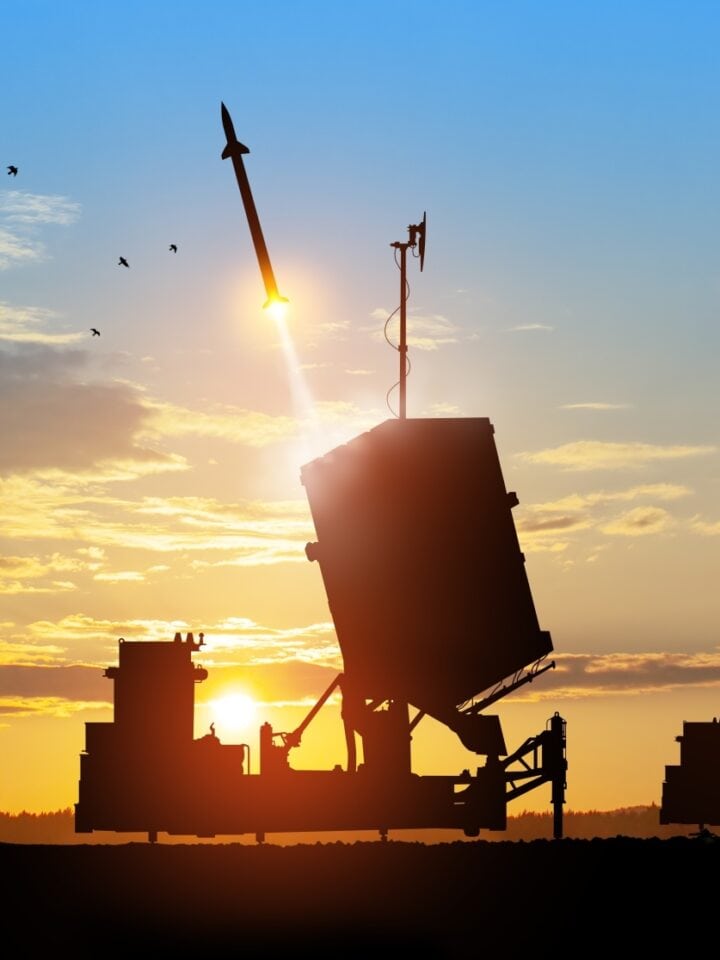 Israel's Iron Dome air-defense missile launches, aimed at the sky at sunset. Photo by Hamara via Shutterstock.com