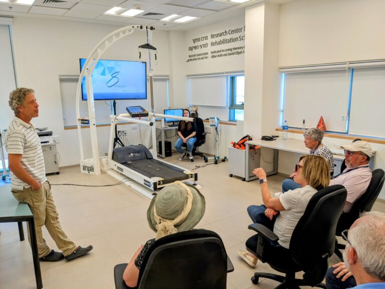 Joan and Bob Oppenheimer of New Jersey, and Joan’s mother, Marianne Lawton, far right, getting a demo of the Translational Neuro-Rehabilitation Lab along with other members of JNF-USA’s Task Force on Disabilities. Photo courtesy of ADI Negev-Nahalat Eran