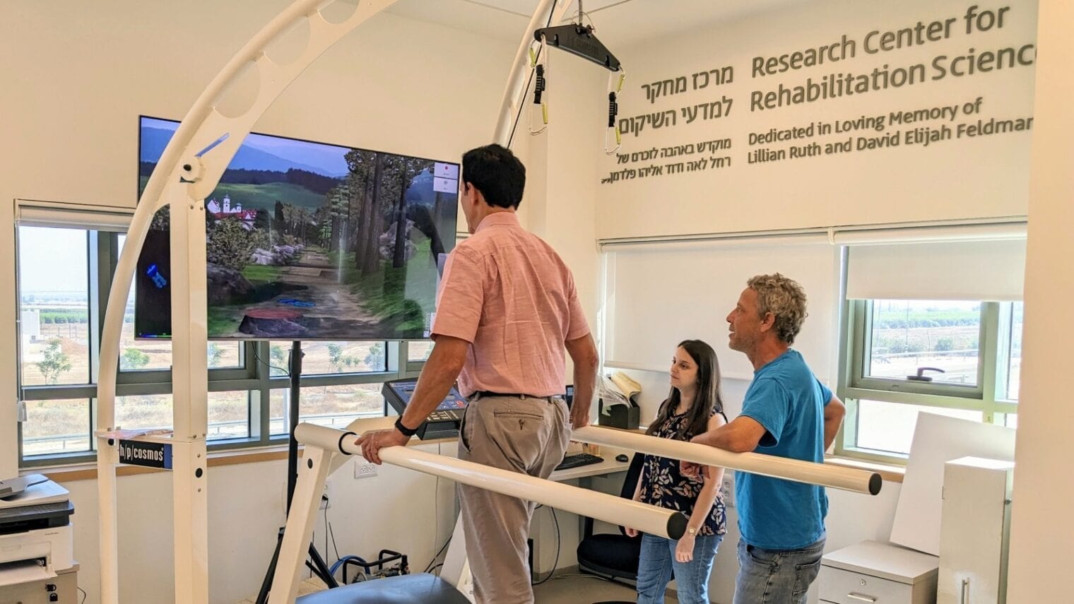 At the Translational Research Lab, JNF-USA supporter and Sephardic Foundation on Aging board member Cliff Russo tries a rehabilitation technology that takes the patient through virtual obstacles to help correct gait. Photo courtesy of ADI Negev-Nahalat Eran