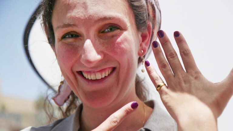 Rikki Zalut Har-Tuv, one of the excavation directors on behalf of the Israel Antiquities Authority, with the ring. Photo by Asaf Peri/City of David