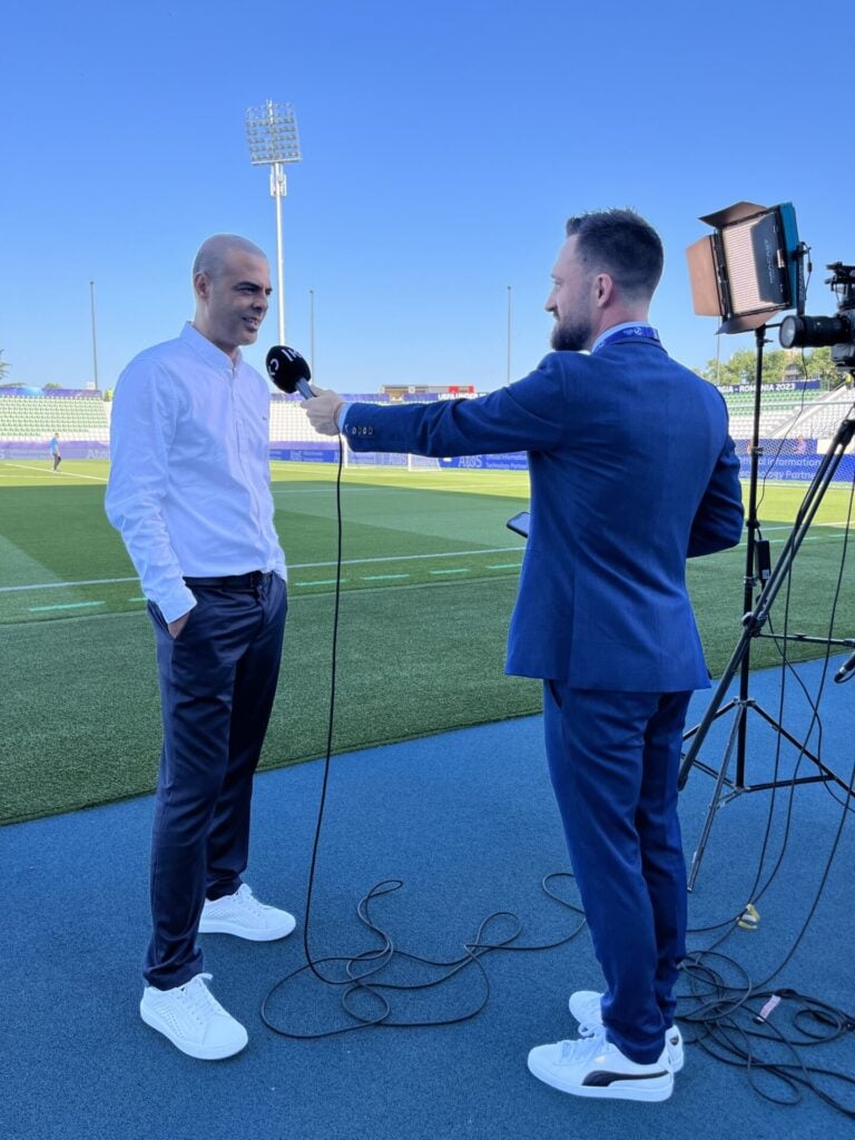 Uri Levy interviewing Guy Luzon, coach of the Israel under-21 team that reached the semifinals of the 2023 UEFA European Under-21 Championship. Photo courtesy of Uri Levy