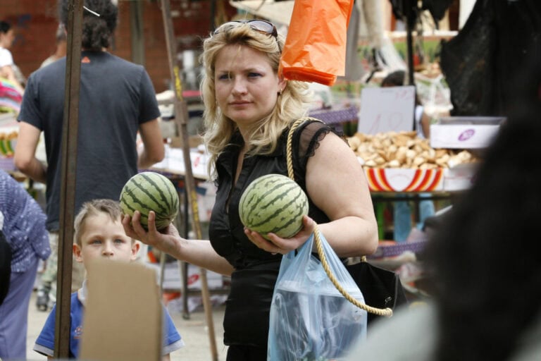 A woman buying watermelons at the market in the Israeli southern city of Sderot. Photo by Michal Fattal/Flash90